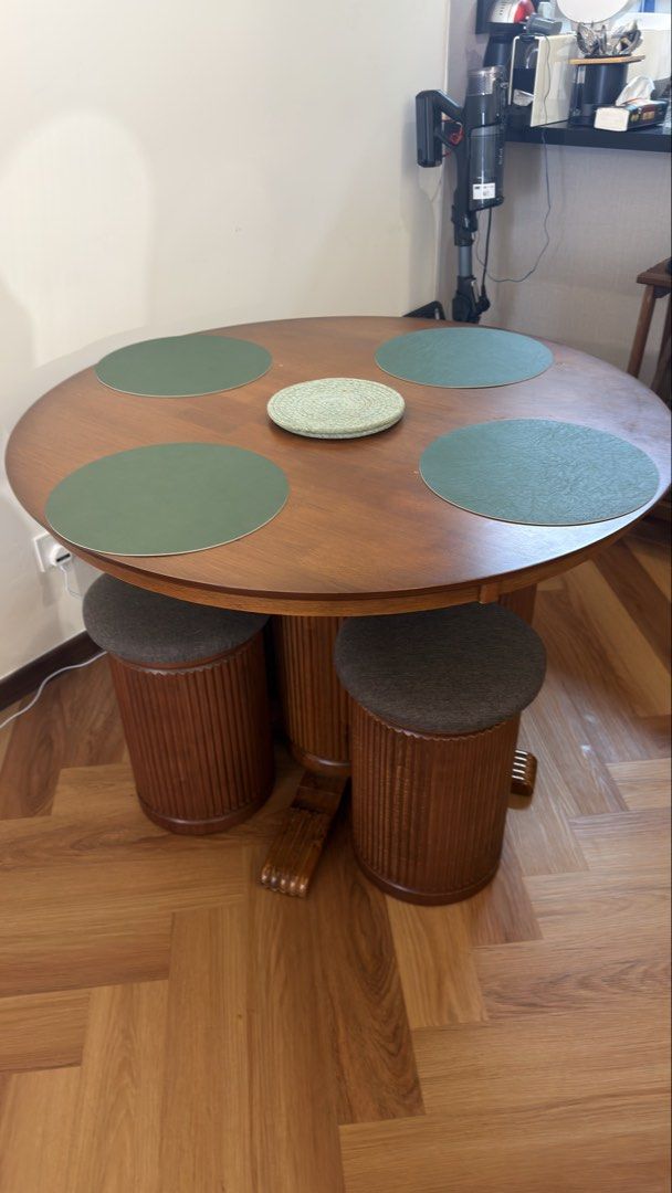 Solid wood round dining table (Category: Tables & Sets) located in Kuala Lumpur. Submitted by almarinik (Listing ID 1456066338, Image 1). Description: Selling my one year old dining table. Comes with 4 solid heavy wooden chair. Got defect during installation, accidentally used wrong screw and protruded a bit (last photo).