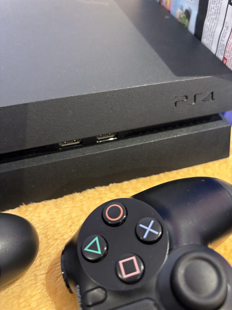 Sony PlayStation 4 PS4 Console with Games and Accessories (Category: PlayStation) located in Quezon City. Submitted by 2ndrepublic (Listing ID 1456128849, Image 2). Description: - Sony PlayStation 4 Console - Two (2) Controllers - Controller Charging Dock - PS Camera - Games Included: - Kart Racers - Just Dance 2016 - Tekken 7 - Call of Duty Black Ops III - Shadow of Mordor - Final Fantasy XV - Power Adapter and Cables Included.