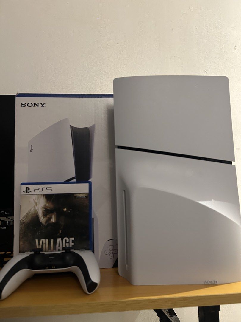 Sony PlayStation 5 Console (Category: PlayStation) located in Pasig City. Submitted by JenoTandoc (Listing ID 1456218446, Image 1). Description: PS5 Console slim 1TB disc version -3 months old bought from datablitz with receipt - Original Box and Packaging - DualSense Controller - w/ resident evil game Price is reasonable .