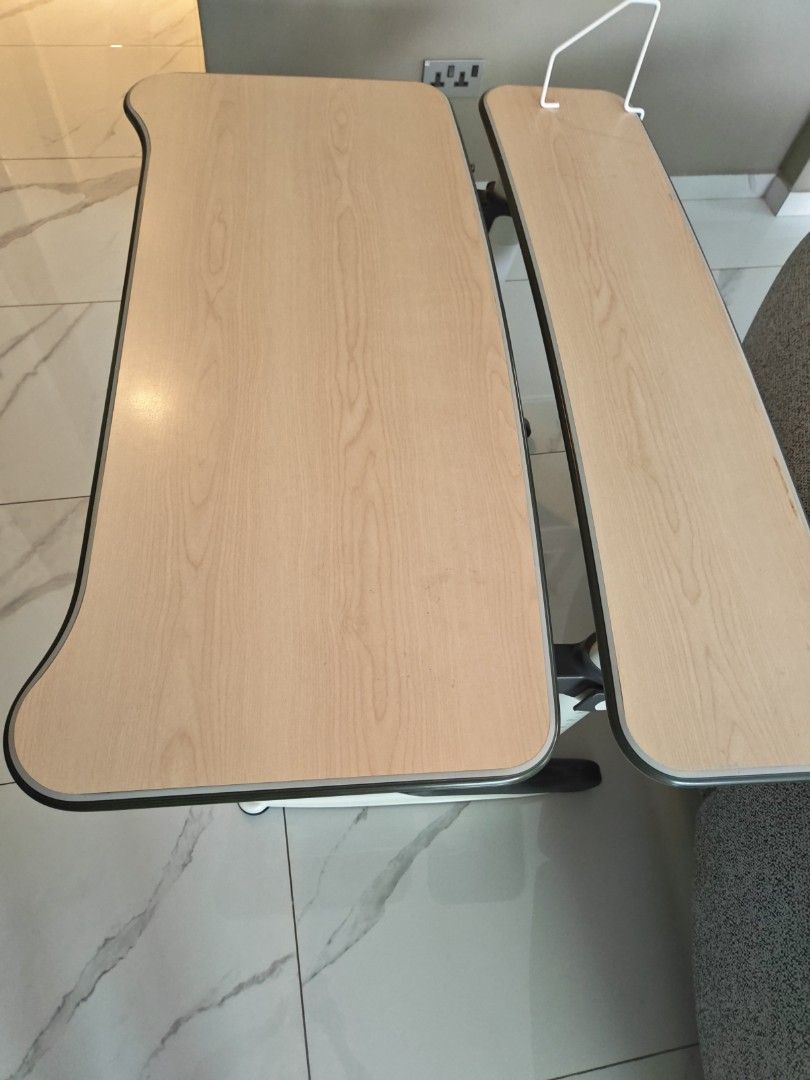 Study table for young ones (Category: Tables & Sets) located in Singapore. Submitted by awsomedeal (Listing ID 1456150310, Image 2). Description: - Adjustable study table designed for young learners. - Features height markings from 90cm to 140cm, allowing it to grow with your child. - Sturdy wooden tabletop, ideal for study and creative activities. - Simple and functional design. - Meetup available at Lorong Chuan..