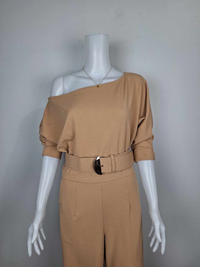 Tan One-Shoulder Jumpsuit with Belt (Category: Jumpsuits) located in Baguio. Submitted by k.lineph (Listing ID 1456188188, Image 3). Description: - Stylish tan jumpsuit - Elegant one-shoulder design - Includes a matching belt to cinch the waist - Comfortable fabric with a nice drape - Features convenient pockets - Versatile for night outs or stylish daytime wear.