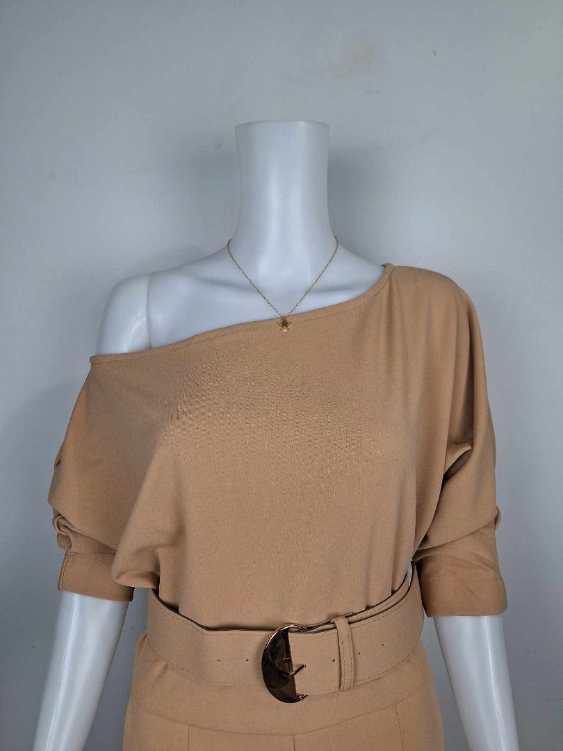 Tan One-Shoulder Jumpsuit with Belt (Category: Jumpsuits) located in Baguio. Submitted by k.lineph (Listing ID 1456188188, Image 1). Description: - Stylish tan jumpsuit - Elegant one-shoulder design - Includes a matching belt to cinch the waist - Comfortable fabric with a nice drape - Features convenient pockets - Versatile for night outs or stylish daytime wear.
