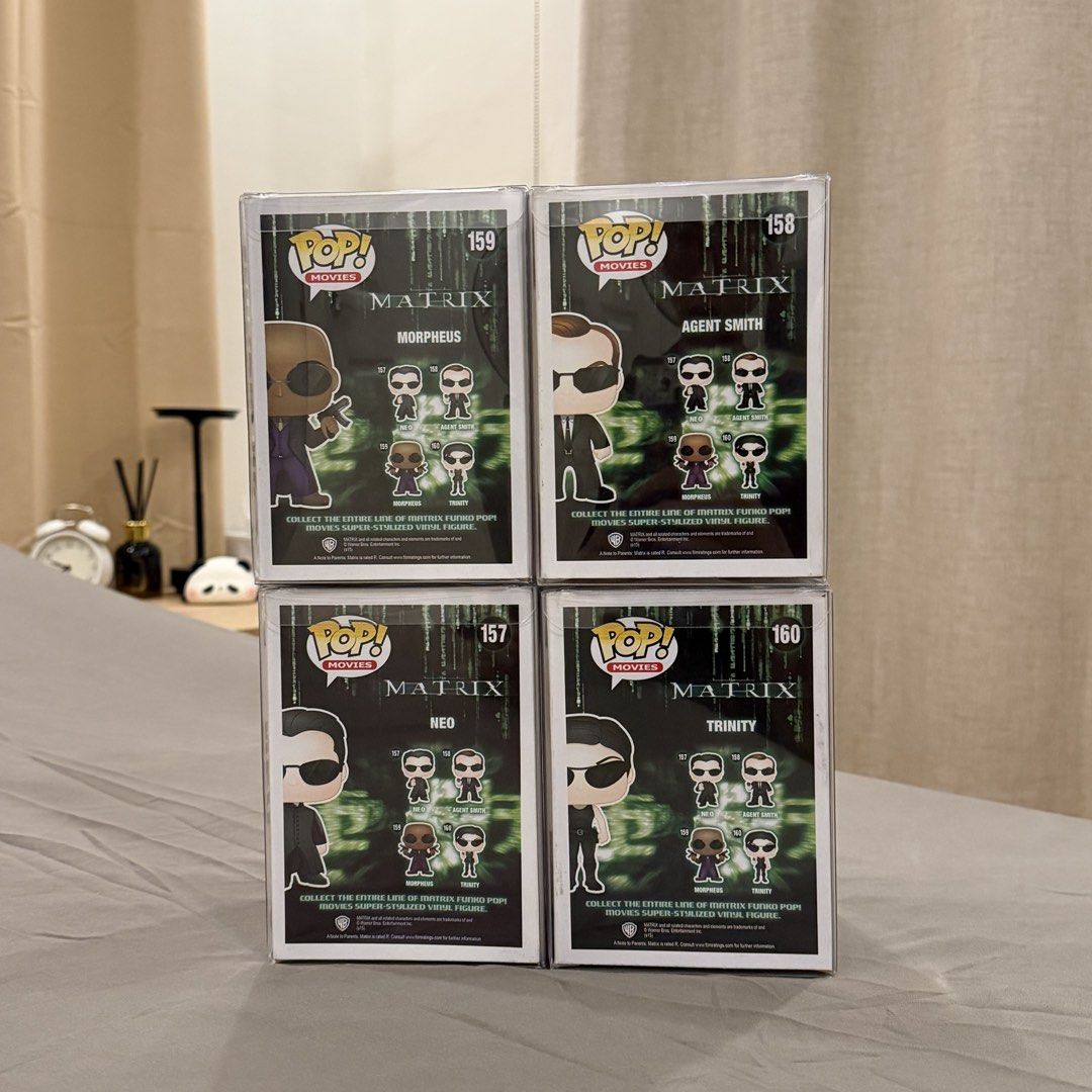 The Matrix Funko Pop Set - Neo, Trinity, Morpheus, Agent Smith (Category: Designer & Blind Box Toys) located in Manila. Submitted by badgalririri (Listing ID 1456184820, Image 3). Description: - Complete set of The Matrix Funko Pop figures - Includes Neo (157), Trinity (160), Morpheus (159), and Agent Smith (158) - All figures are in their original - Ideal for The Matrix fans and Funko Pop collectors Price is nego for sure buyers, pm me lang po.