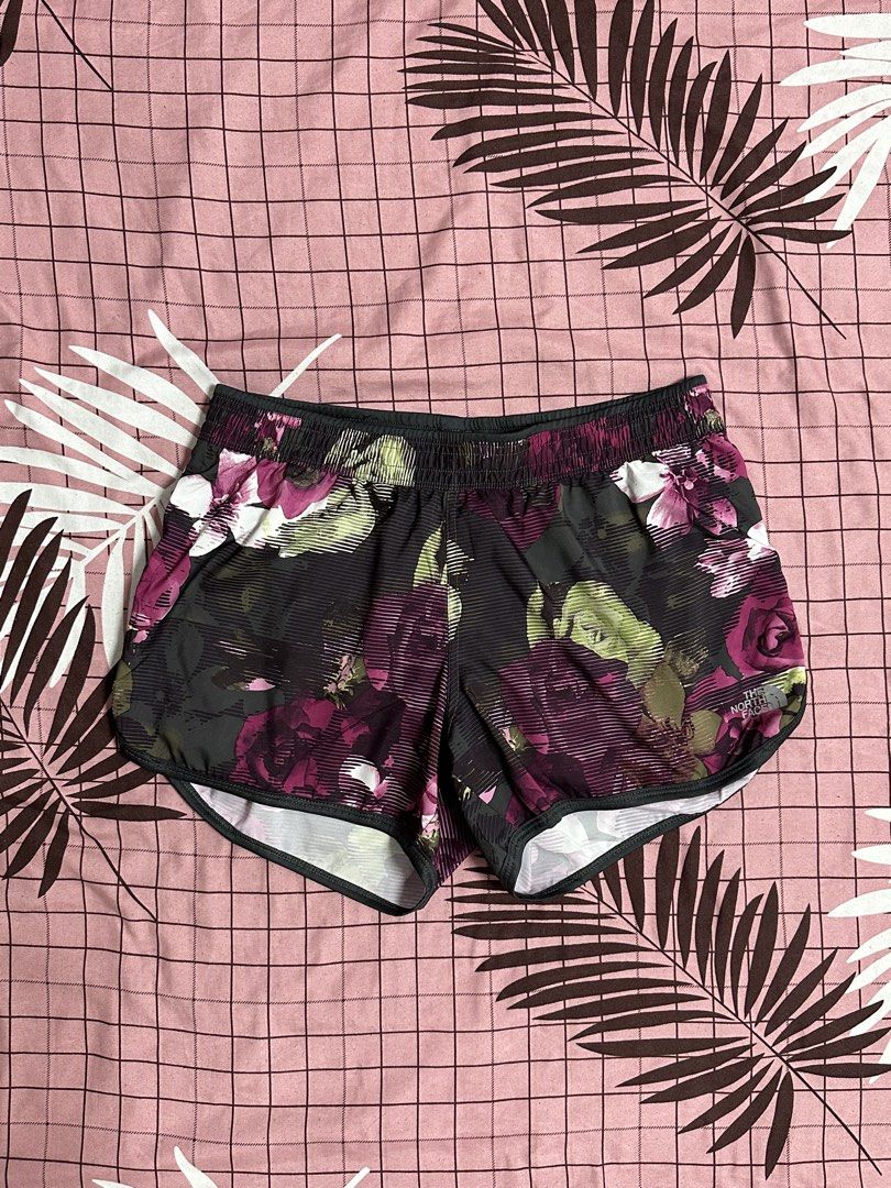 TNF The North Face Womens Shorts (Category: Activewear) located in Pasig City. Submitted by kcstuffs (Listing ID 1456164574, Image 1). Description: The North Face women’s athletic running shorts featuring a dark multicolor floral rose print and a comfortable elastic waistband.Made from 100% polyester fabric with a rayon fabric type, these shorts are lightweight, quick-drying, and easy to care for. Like new condition Medium Waist 15 inches (30-32 