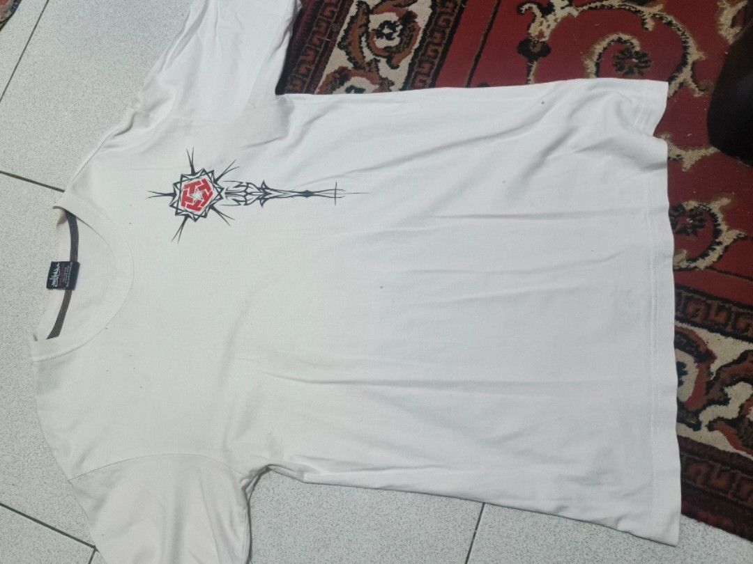 Tribal Gear Tee (Category: Tshirts & Polo Shirts ) located in Las Pinas. Submitted by freeturtle_09ac78 (Listing ID 1456196059, Image 1). Description: Tribal Gear Tee issue is pinholes and one little stain lang po size S US size L27 W23.