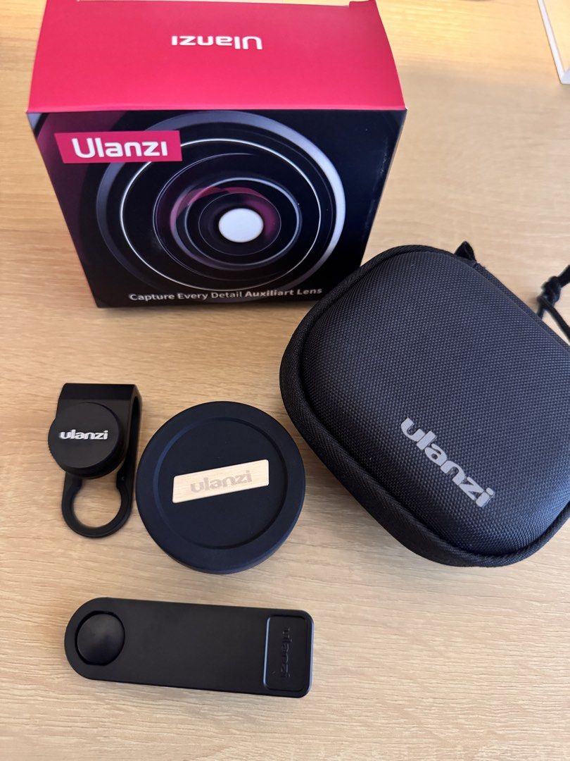Ulanzi Auxiliary Lens Kit with Clip and Case (Category: Other Photography Accessories) located in Manila. Submitted by krysreyes_ (Listing ID 1456070712, Image 2). Description: - Ulanzi auxiliary lens kit - Enhance your phone's camera - Includes clip-on lens - Lens cap included - Carrying case included - Original box included.