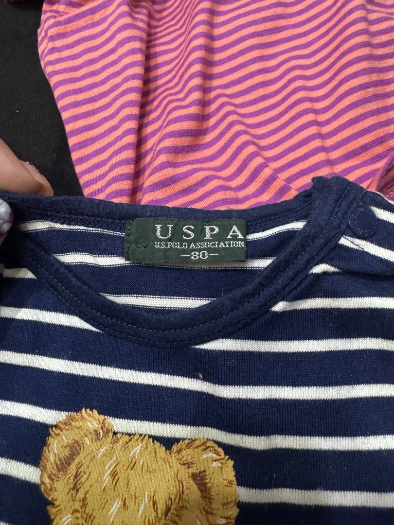 Uniqlo Toddler T-shirts Bundle (Category: Babies & Kids Fashion) located in Muntinlupa City. Submitted by readthedetails (Listing ID 1456186383, Image 3). Description: - Bundle of 6 kids t-shirts - Includes Uniqlo pink/purple striped tee (90cm) - USPA navy/white striped tee with teddy bear graphic - Green tee with car graphic - Plain white tee with pocket - Plain black tee - White tee with Snoopy on a digger - Great for everyday wear.