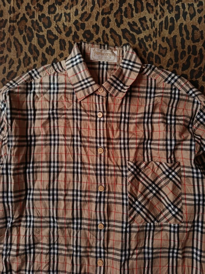 Vintage Burberrys Plaid Longsleeve (Category: Tshirts & Polo Shirts ) located in Davao. Submitted by VFinds414 (Listing ID 1456086653, Image 2). Description: Vintage Burberrys Plaid Longsleeve Medium 22 Width / 27.5 Length Excellent Condition 800 add ship.