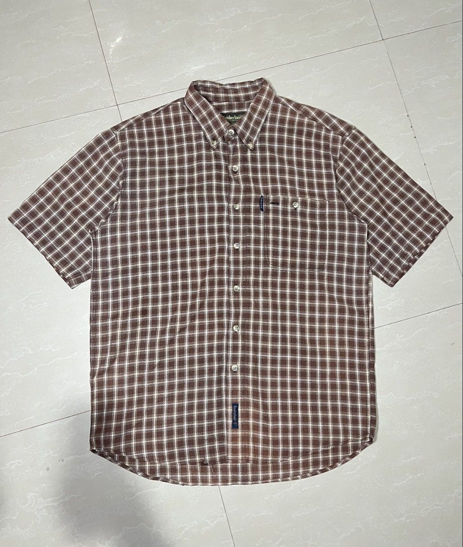 vintage Timberland polo button-down checkered pattern (Category: Tshirts & Polo Shirts ) located in Luna. Submitted by lareign (Listing ID 1456117633, Image 2). Description: -Color rate: 9/10 -Dimes: 24x28.5 -Issue: check the last photo -Overall: good condition - perfect for casual wear .