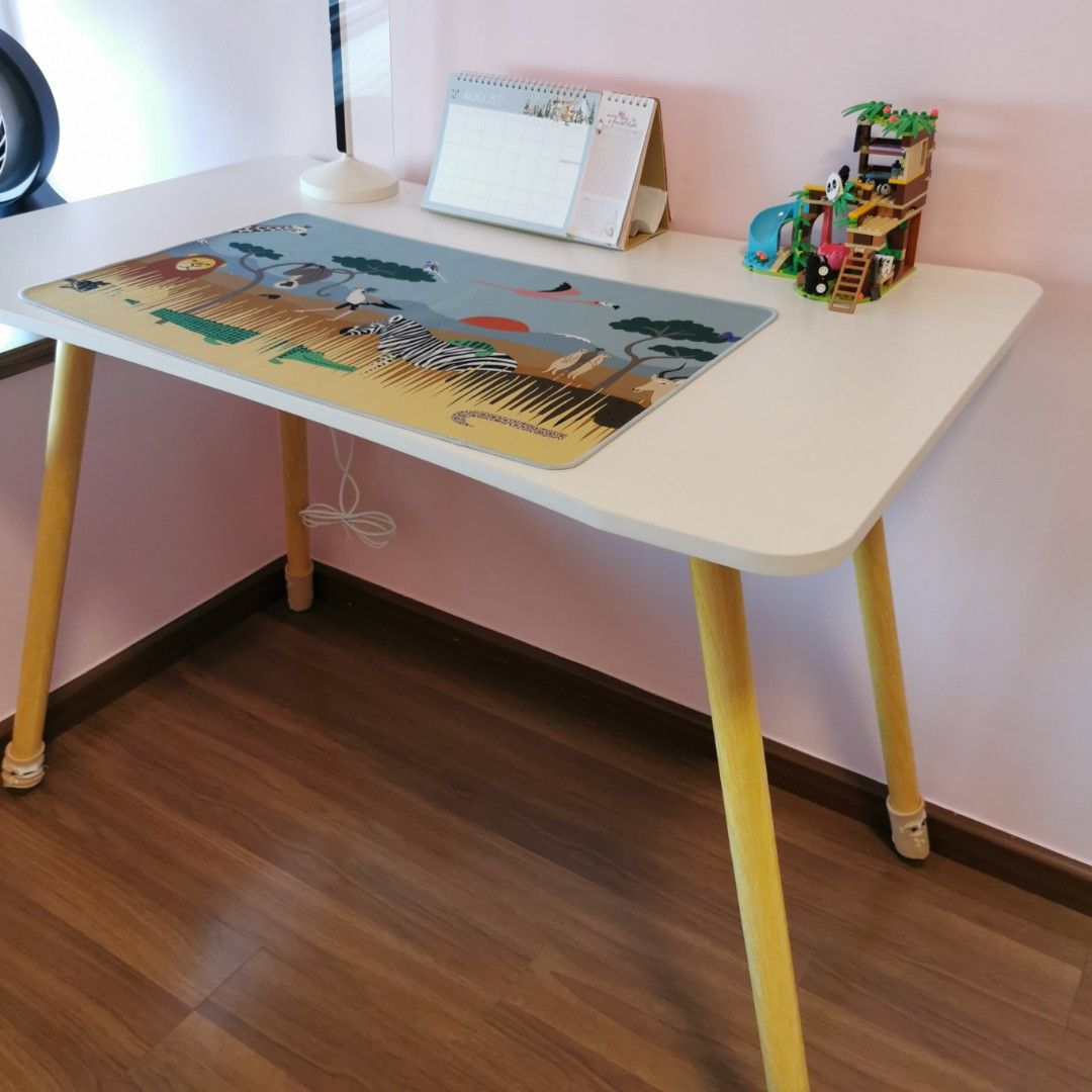 White Study Table (Category: Tables & Sets) located in Singapore. Submitted by bravowewe (Listing ID 1456178930, Image 3). Description: White curvy corner study table Safe for children Measurement L = 100 B = 60 H = 70 Ideal for child study /teenager. Legs can be dismantle for easy carry. Light weight Cash and carry deal.