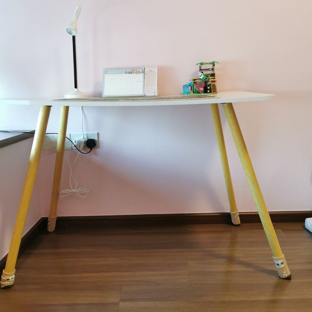 White Study Table (Category: Tables & Sets) located in Singapore. Submitted by bravowewe (Listing ID 1456178930, Image 2). Description: White curvy corner study table Safe for children Measurement L = 100 B = 60 H = 70 Ideal for child study /teenager. Legs can be dismantle for easy carry. Light weight Cash and carry deal.