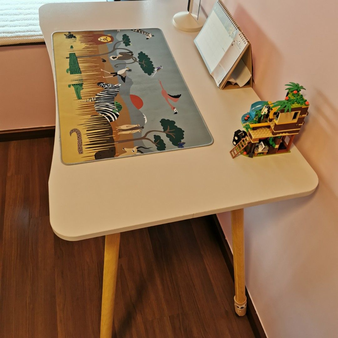 White Study Table (Category: Tables & Sets) located in Singapore. Submitted by bravowewe (Listing ID 1456178930, Image 1). Description: White curvy corner study table Safe for children Measurement L = 100 B = 60 H = 70 Ideal for child study /teenager. Legs can be dismantle for easy carry. Light weight Cash and carry deal.
