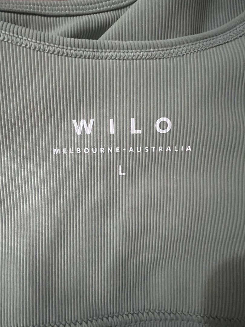 WILO Ribbed Sports Bra Size L (Category: Activewear) located in Taguig. Submitted by strutstella (Listing ID 1456190185, Image 3). Description: - Brand: WILO Melbourne-Australia - Type: Ribbed Sports Bra - Size: L - Color: Light Green - Material: 75% Nylon, 25% Spandex - Care: Cold hand wash, gentle machine wash, dry flat away from sun. Do not tumble dry, iron, or bleach. Avoid rough surfaces. Best for 36 bust .