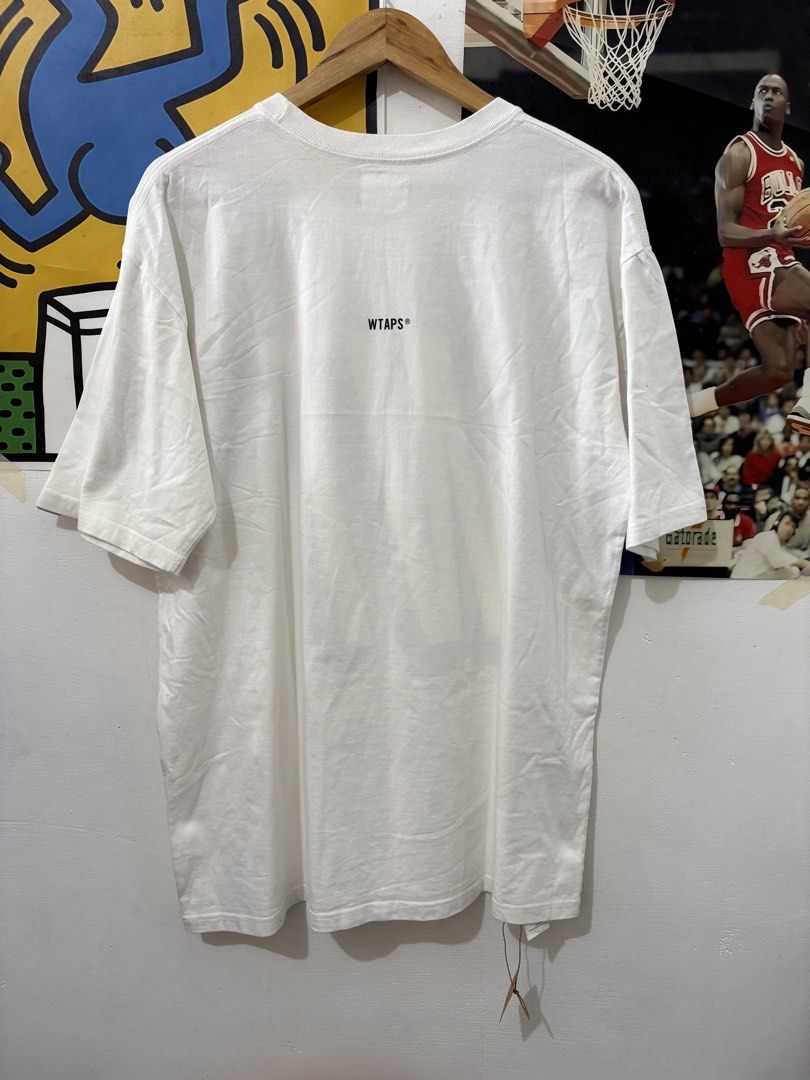WTAPS (Category: Tshirts & Polo Shirts ) located in Echague. Submitted by jake_rc (Listing ID 1456178624, Image 3). Description: Wtaps Size 5 Dimes 23 x 30.5 Medyo may dumi sa itaas ng print at small stain Price 650 plus SF.