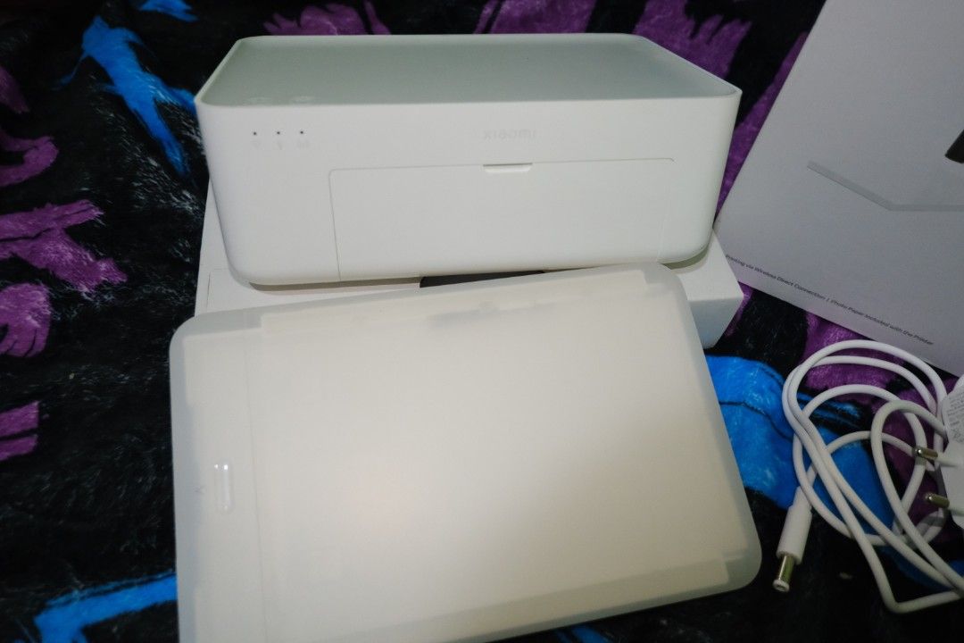 Xiaomi Instant Photo Printer 1S Set (Category: Printers, Scanners & Copiers) located in Bacoor. Submitted by sidequestbypretz (Listing ID 1456099964, Image 3). Description: - Xiaomi Instant Photo Printer 1S Set - Prints both 3" and 6" photos - Wireless direct connection for easy printing - Charger included - Ideal for capturing and printing memories on the go -No photo paper.