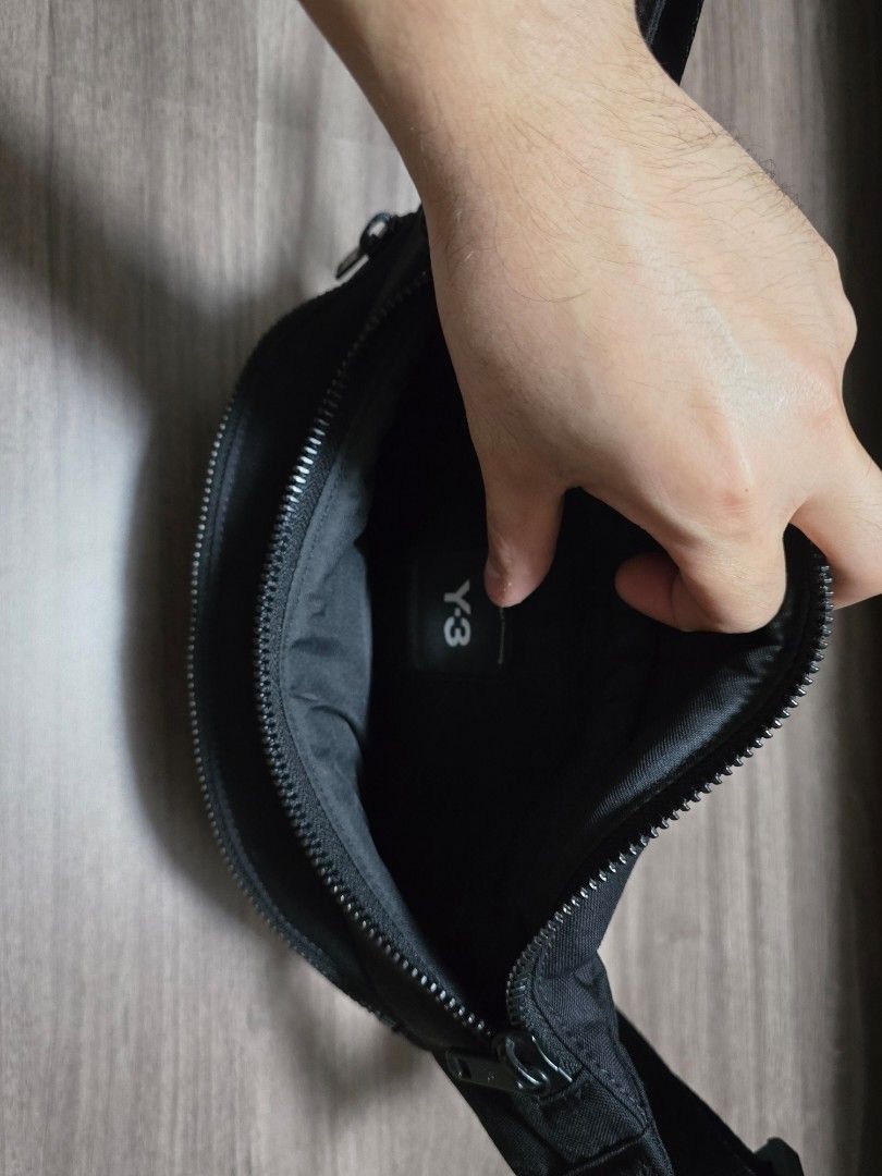 Y-3 Black Nylon Crossbody bag (Category: Luxury Bags & Wallets) located in Manila. Submitted by ddc77 (Listing ID 1456191034, Image 2). Description: - Black Y-3 sling - Main compartment - Front zippered pocket - Lots of padding inside - Comes w/ its original dustbag - Bought 11k - Used once. 10/10 like new condition .
