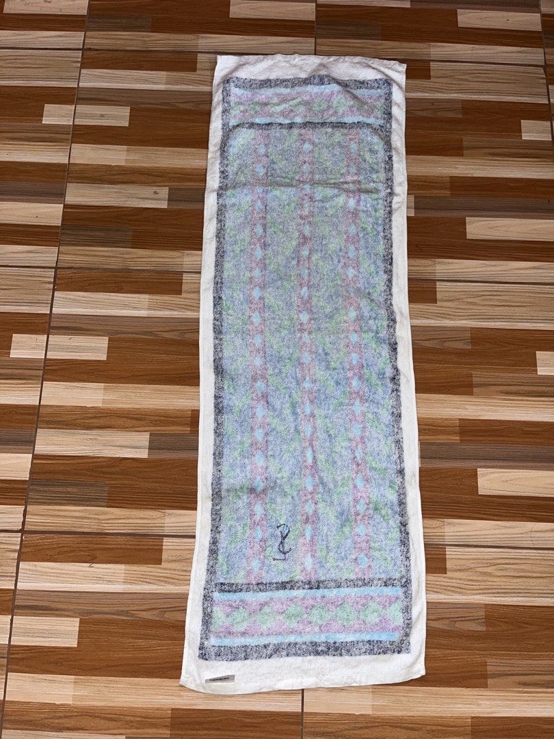 Yves Saint Laurent YSL Monogram Towel (Category: Luxury Apparel) located in Nabua. Submitted by lastthrift2.0 (Listing ID 1456074181, Image 3). Description: Dimes•length 39,width 13 - Authentic YSL towel - Features iconic YSL monogram - Geometric pattern design - Soft and absorbent material - Perfect for gym, beach, or home use - Approximate dimensions: 40cm x 100cm - Made in China.