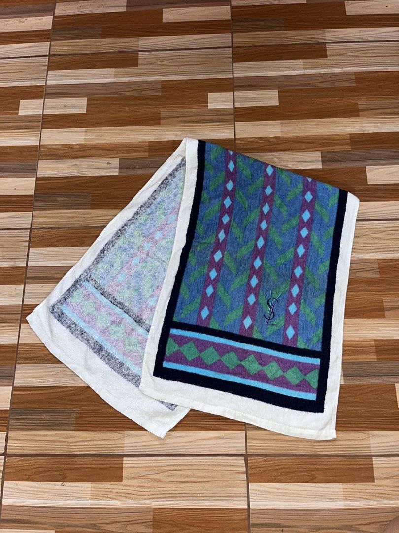 Yves Saint Laurent YSL Monogram Towel (Category: Luxury Apparel) located in Nabua. Submitted by lastthrift2.0 (Listing ID 1456074181, Image 1). Description: Dimes•length 39,width 13 - Authentic YSL towel - Features iconic YSL monogram - Geometric pattern design - Soft and absorbent material - Perfect for gym, beach, or home use - Approximate dimensions: 40cm x 100cm - Made in China.