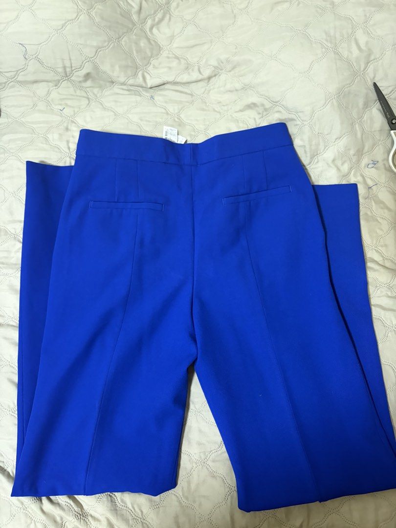 ZARA Blue Wide Leg Trousers (Category: Other Bottoms) located in Pasig City. Submitted by lex.preloved (Listing ID 1456184701, Image 2). Description: - ZARA Royal Blue Wide Leg Trousers - Size: S, Waist 32 - High-waisted - Used once only.