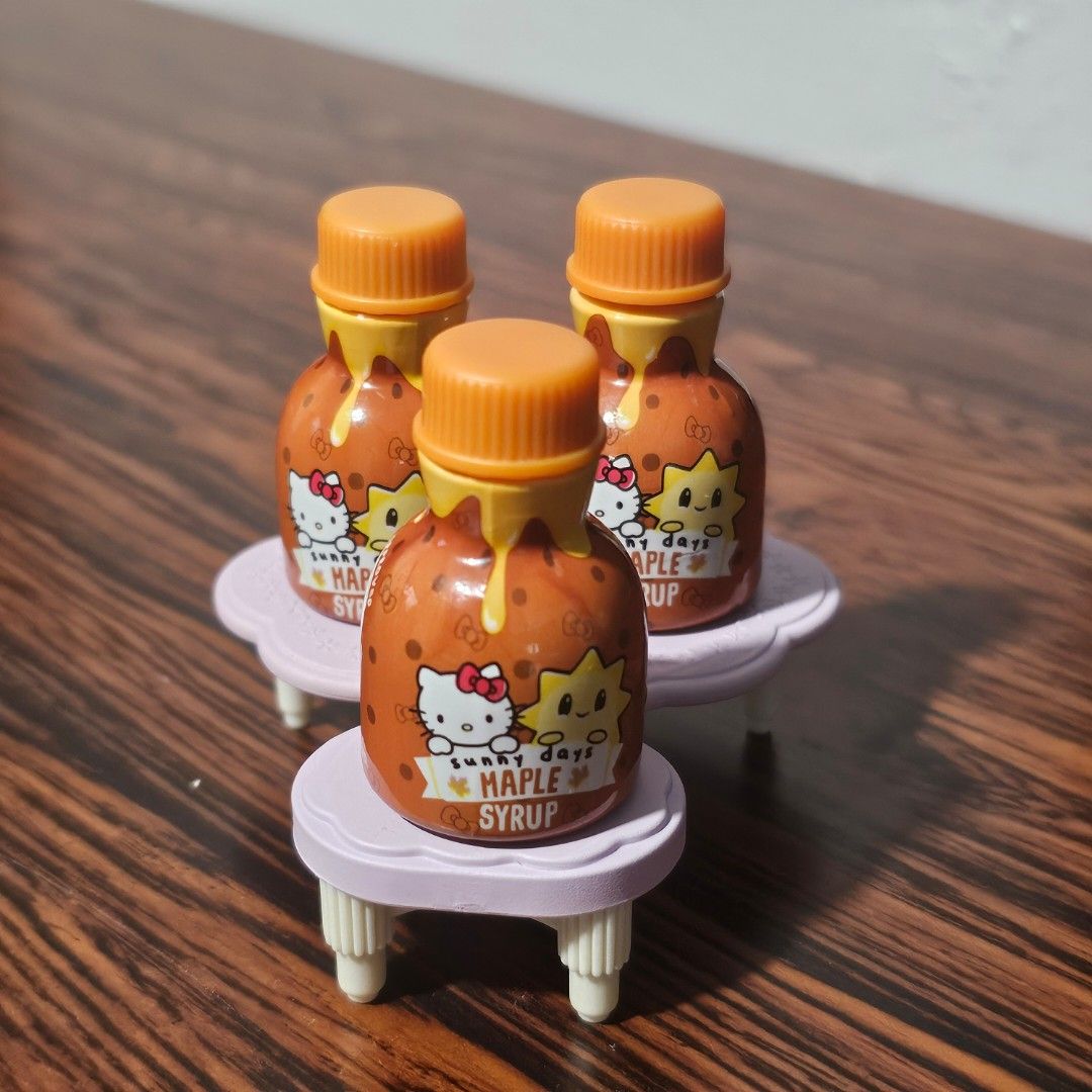 miniverse Hello Kitty Sunny Days Maple Syrup Bottles (Category: Water Bottles & Tumblers) located in Rizal. Submitted by viviperera (Listing ID 1456229984, Image 1). Description: price per piece cute Kitty maple syrup bottles - Features a fun 'sunny days' design - Comes with orange caps - Ideal for collectors or as a special breakfast treat - Small bottles, perfect for display.