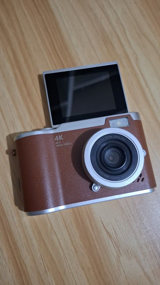4K Digital Camera 48MP 18X Zoom Flip Screen (Category: Cameras) located in Makati City. Submitted by isell_goods (Listing ID 1456345008, Image 1). Description: - Capture memories in stunning 4K video and 48.0 megapixel photos. - Powerful 18x digital zoom to get closer to the action. - Flip-up screen perfect for easy selfies and vlogging. - Includes a macro lens option for detailed close-up shots. - Ready for your next adventure, this brown digita