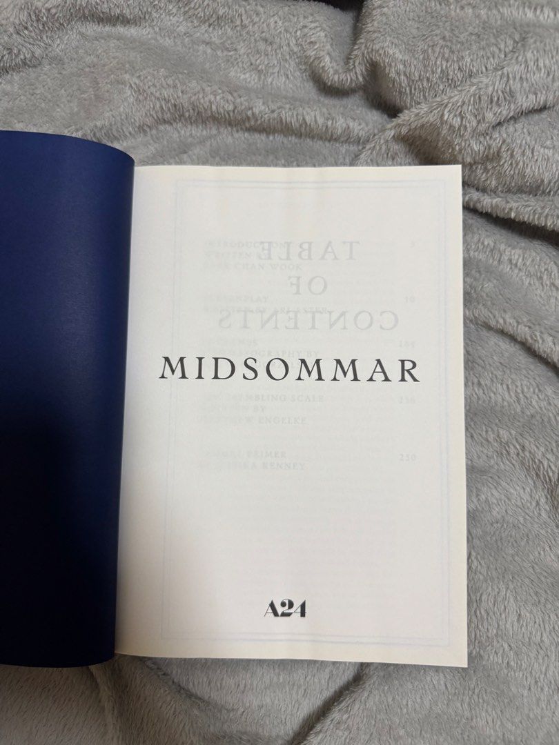 A24 Midsommar Official Screenplay Book (Category: Storybooks) located in Manila. Submitted by quintessesommerset (Listing ID 1438349329, Image 2). Description: - Midsommar Movie Script Book - Written and directed by Ari Aster - Includes scenes from the film - Features the flower-covered woman and burning structure scenes - Contains script excerpts - Softcover.