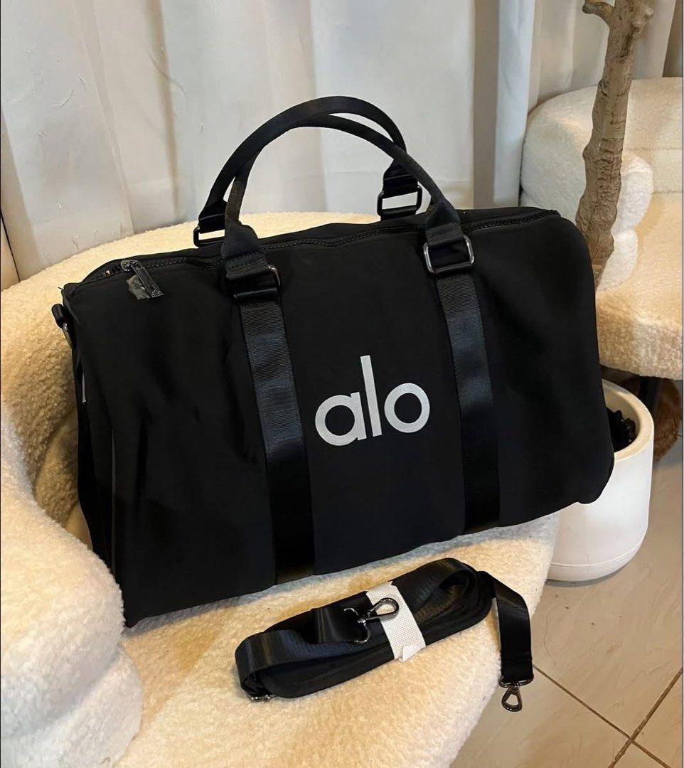 Alo Duffle Bag Black (Category: Cross-body Bags) located in Manila. Submitted by lovekara (Listing ID 1456318419, Image 2). Description: Height: 28cm Width : 21cm Length : 43cm .