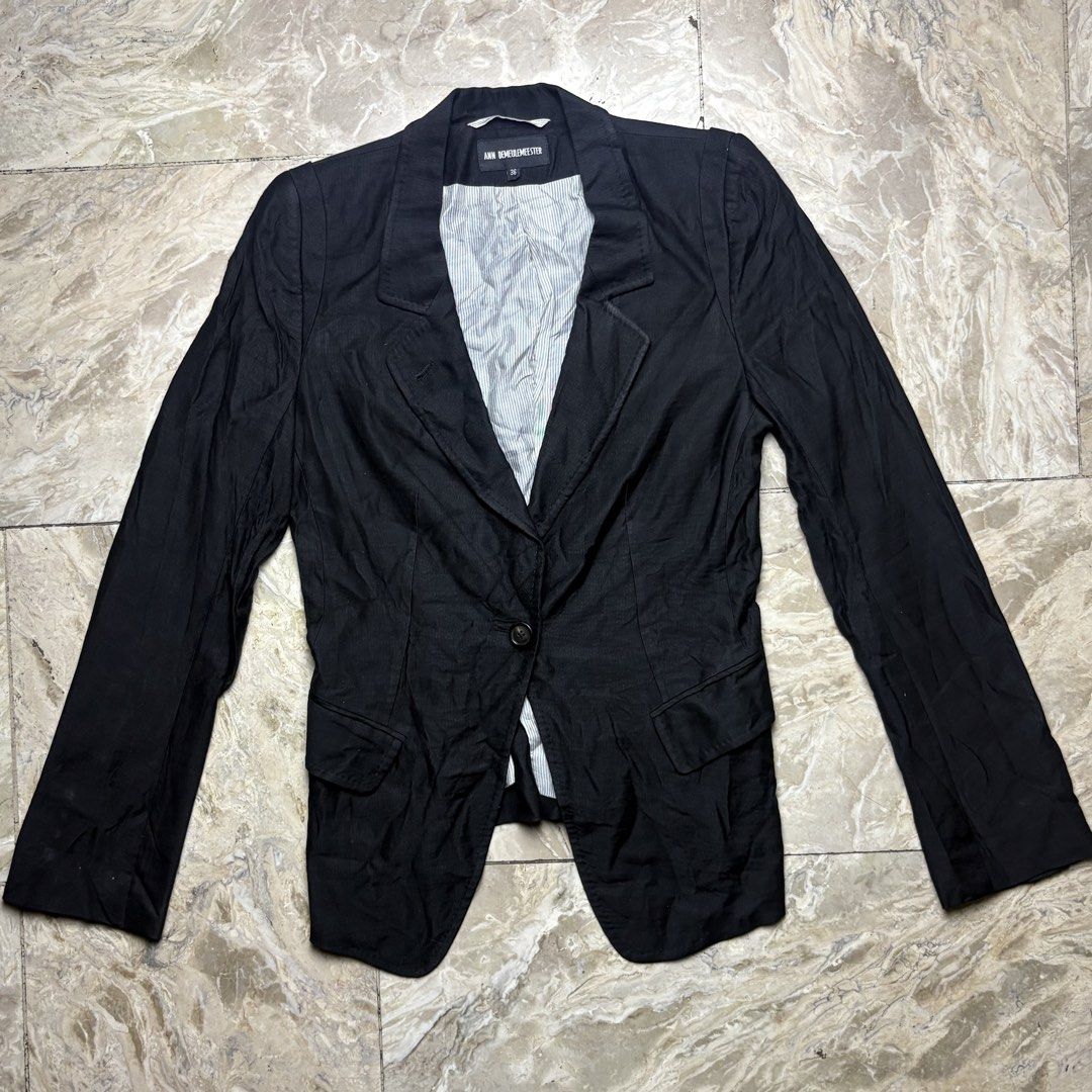 Ann Demeulemeester black single-button blazer featuring a distinctive striped interior lining (Category: Coats, Jackets and Outerwear) located in Dinalupihan. Submitted by hell.thrift (Listing ID 1456346818, Image 1). Description: Ann Demeulemeester black single-button blazer featuring a distinctive striped interior lining -Size:36 On tag -Dimensions in inches Length:23.5 Width:18 -No issue -9/10 Condition.