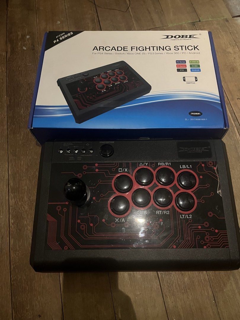 Arcade Stick DOBE (Category: Controllers) located in Manila. Submitted by andreuarfp (Listing ID 1456398723, Image 1). Description: - DOBE ARCADE STICK - Swapped x, y, a, b for SANWA buttons. - Working with included cable and box. - Used mostly with PC and PS4. RFS: Not being used. Quit..