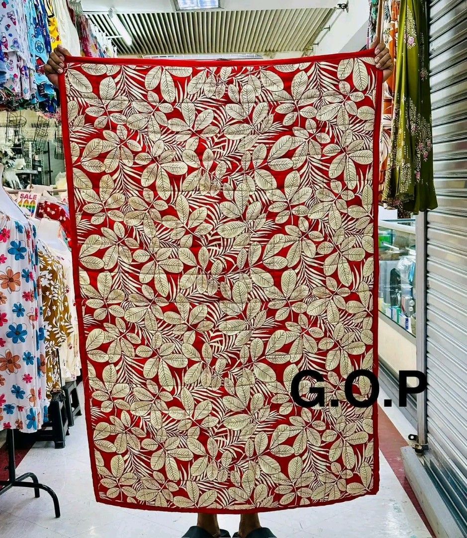 Assorted Design Quilts/Blankets - Red, Black, Green (Category: Bedding & Towels) located in Manila. Submitted by marvieobordo (Listing ID 1456265882, Image 3). Description: - Set of 4 vibrant quilts or blankets. - Designs include: red geometric, black floral, red leaf motif, and green Christmas poinsettia. - Perfect for adding color or cozy nights. - All approximately the same size..