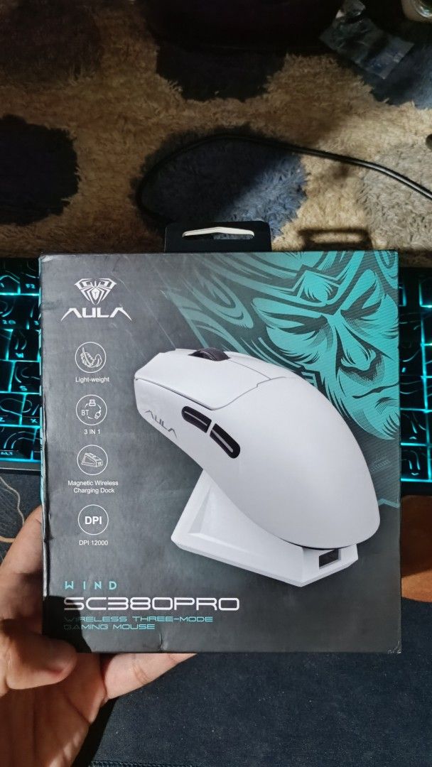 AULA 380PRO (Category: Mouse & Mousepads) located in Batangas. Submitted by mjlinatoc685125 (Listing ID 1456315799, Image 1). Description: - Brand: AULA - Model: 380PRO - Type: Wireless Three-Mode Gaming Mouse - Color: Black - Features: Lightweight, Magnetic Wireless Charging Dock - Condition: Excellent, Sealed.
