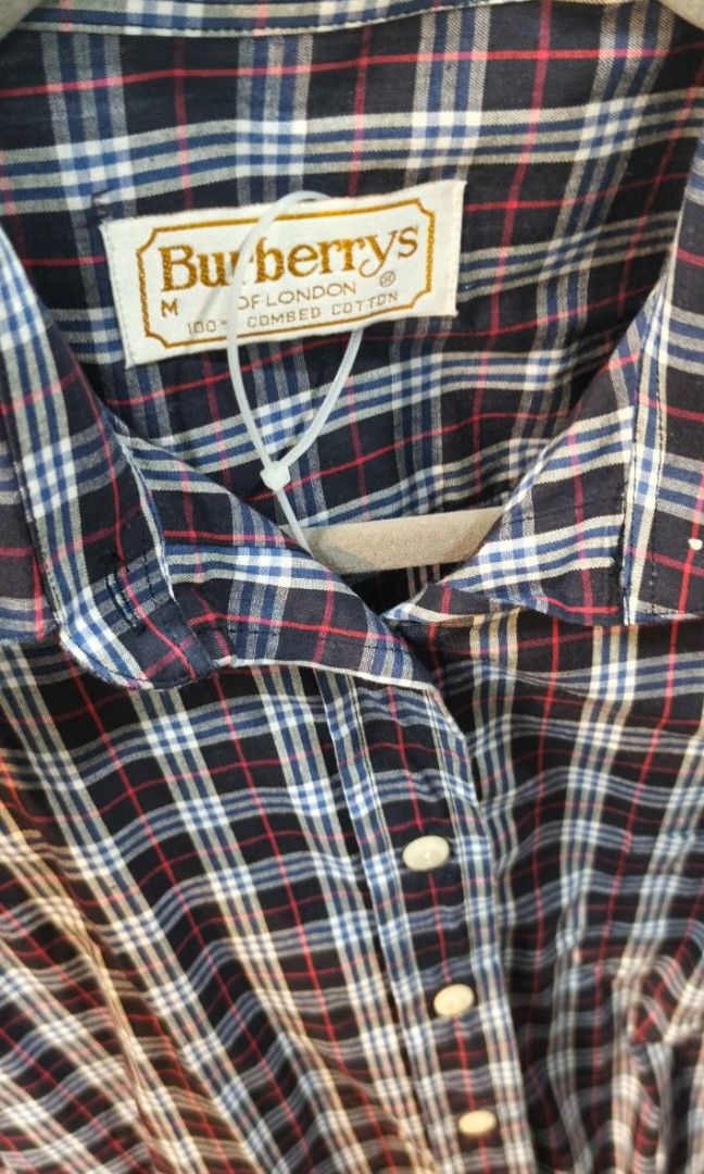 Authentic Burberry's Plaid Polo Long Sleeves (Category: Longsleeves) located in Aguinaldo. Submitted by designerlaneph (Listing ID 1456346140, Image 3). Description: Previously owned Burberry's plaid polo long sleeves size medium 💯% original in mint condition free shipping onhand.