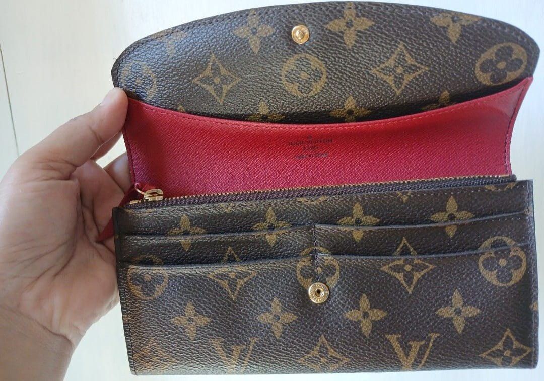Authentic Emillie Louis Vuitton Monogram Canvas Wallet with Red Interior (Category: Luxury Bags & Wallets) located in Taguig. Submitted by sandzclick (Listing ID 1456307685, Image 3). Description: - Classic Louis Vuitton monogram canvas wallet - Vibrant red interior for a pop of color - Ample card slots for organization - Zippered compartment for coins or small essentials - Secure snap closure to keep everything safe - Timeless and practical for 
