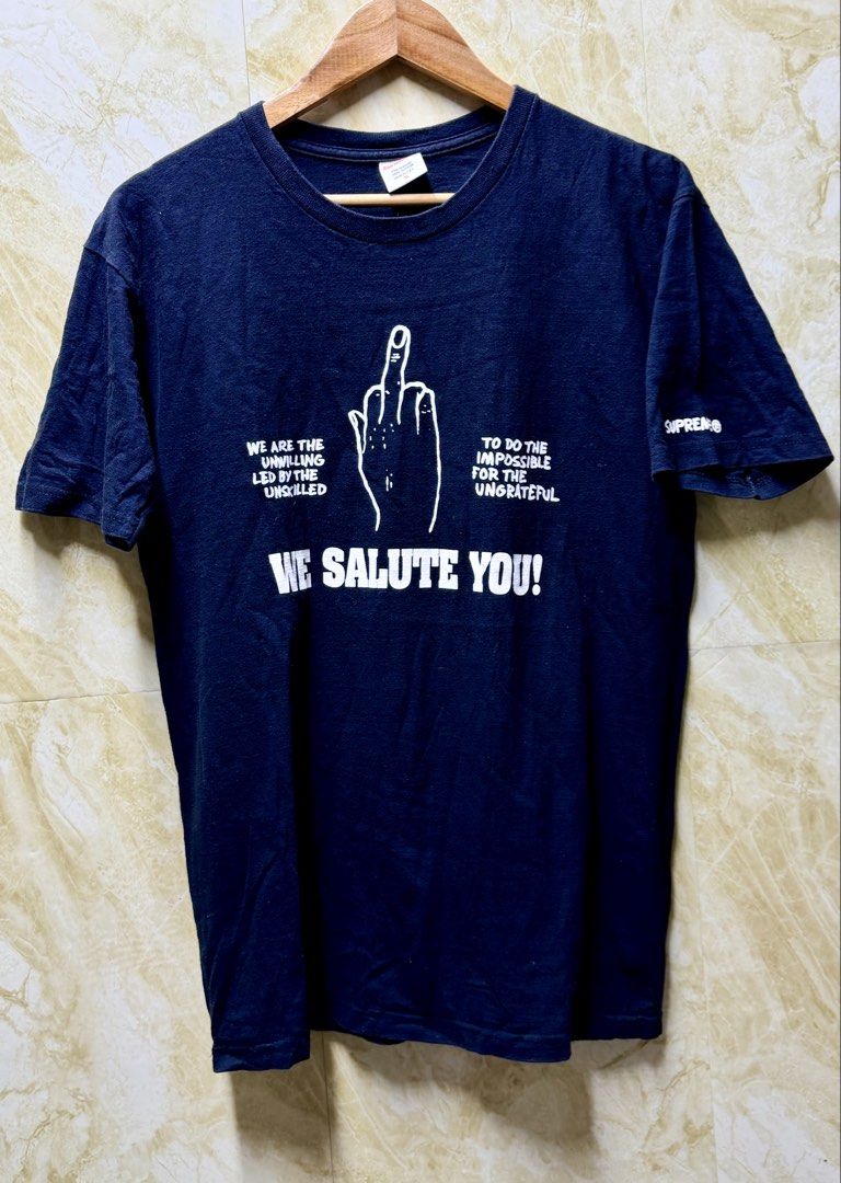 Authentic Supreme "Salute" Tee from the SS11 Collection (Category: Tshirts & Polo Shirts ) located in Batangas. Submitted by cjayf (Listing ID 1456249633, Image 1). Description: Size: Medium (Men’s) Color: Faded Black (Nice vintage look) Condition: 9/10. Smooth cotton blank, graphics are still very clean and thick with no heavy cracking. Sleve print is 100% solid. .