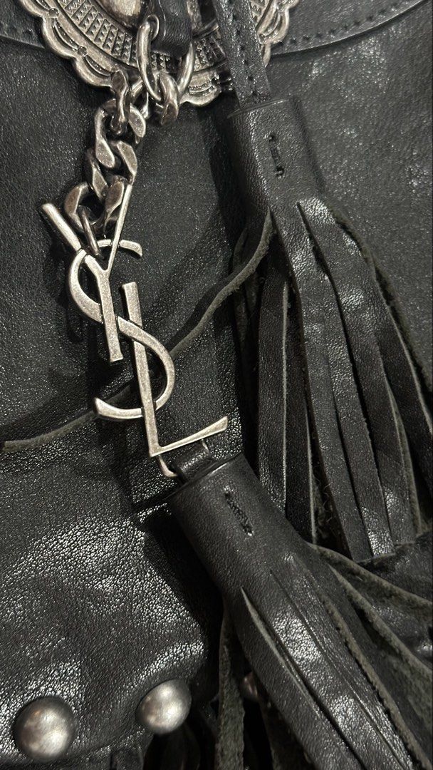 Authentic YSL Fringe Tassel Sling Bag (Category: Luxury Bags & Wallets) located in Las Pinas. Submitted by marshmallowmax (Listing ID 1456347426, Image 3). Description: Slightly used but missing 1 stud under flap-refer photo Fits big size phones With dustbag.