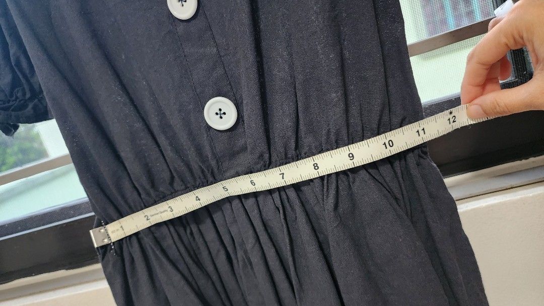 Black Puff Sleeve Peplum Top with Buttons (Category: Blouses) located in Manila. Submitted by trueeagle_5e163a (Listing ID 1456393543, Image 3). Description: - Elegant black top - Stylish puff sleeves - Flattering gathered waist - Chic peplum hem - Three white buttons down the front - Adjustable ties at the back - Fabric with a subtle sheen - Chest measurement: approximately 15 inches -preloved 🌿 Pay via Gcash, Maya, Gotyme 🌿 Shipping care of b