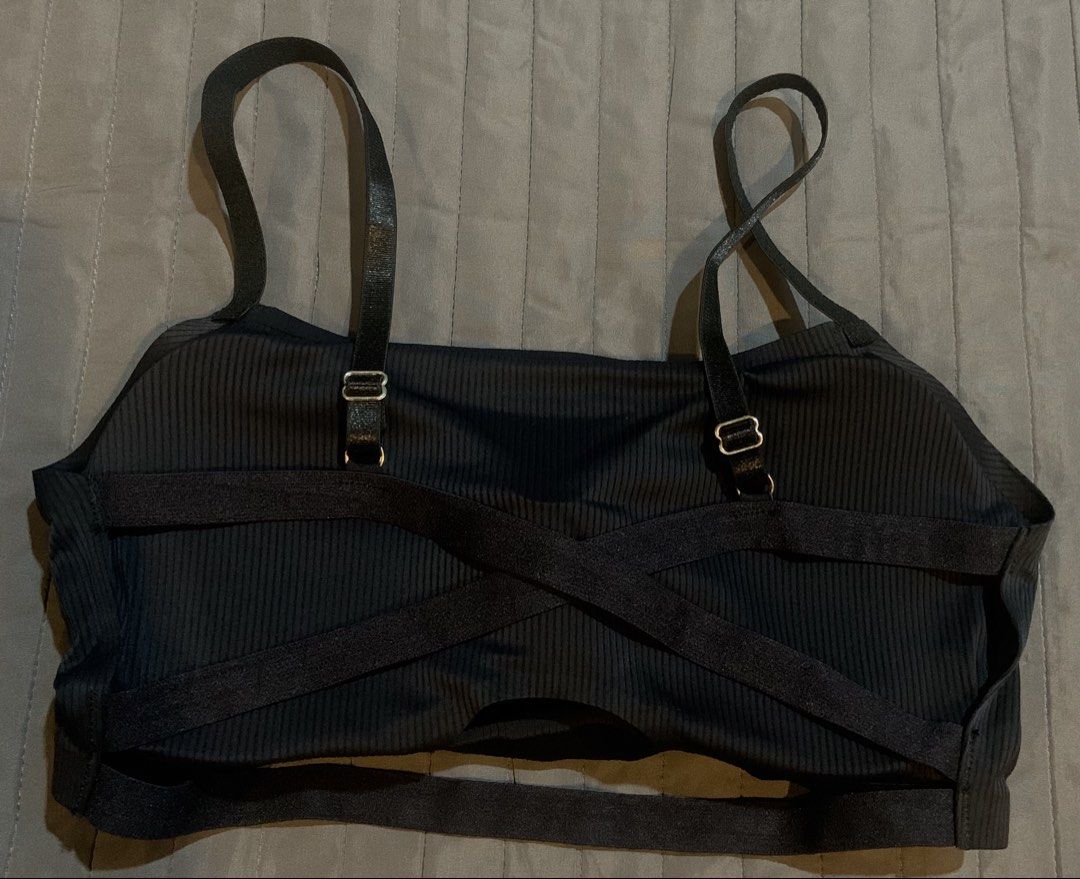 Black Ribbed Sports Bra with Strappy Back (Category: Activewear) located in Manila. Submitted by jhenym (Listing ID 1456307828, Image 3). Description: - Black ribbed sports bra - Adjustable straps for a perfect fit - Chic criss-cross back design - Stretchy and soft fabric for ultimate comfort - Supportive for workouts - Versatile for everyday casual wear.