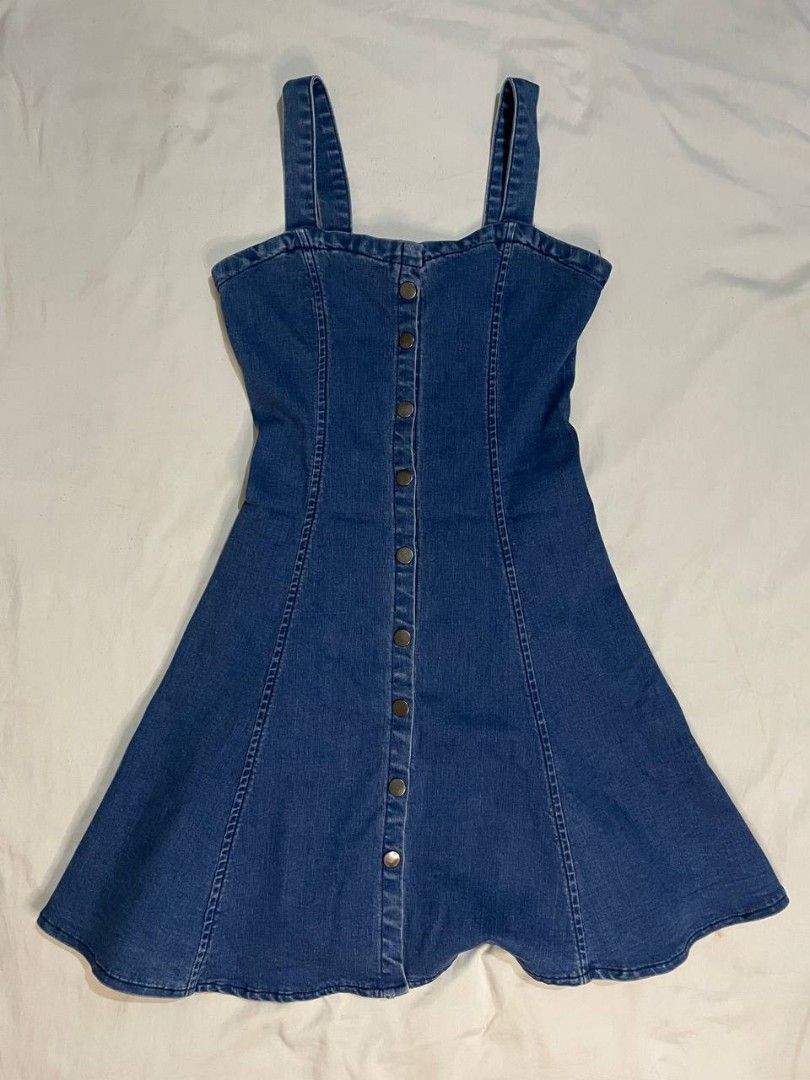 Dark Blue Denim Button Down Flared A-line Mini Dress (Category: Dresses) located in Binan City. Submitted by declutterbyjwy (Listing ID 1456397324, Image 1). Description: bust: 32-34" | waist: 24-27 | length: 31" - there's minor flaw lang (last photo) but unnoticeable.