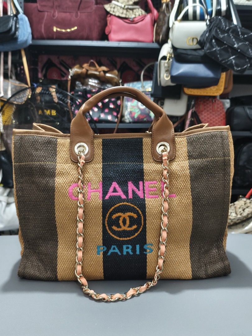 Chanel Paris Striped Canvas Tote Bag (Category: Luxury Bags & Wallets) located in Bulacan. Submitted by abejeroamy80846 (Listing ID 1456362039, Image 1). Description: - Chanel tote bag - Chic woven striped pattern in brown and black - "CHANEL PARIS" lettering and iconic CC logo detail - Comfortable leather handles and stylish chain strap - Spacious interior, perfect for everyday or travel.
