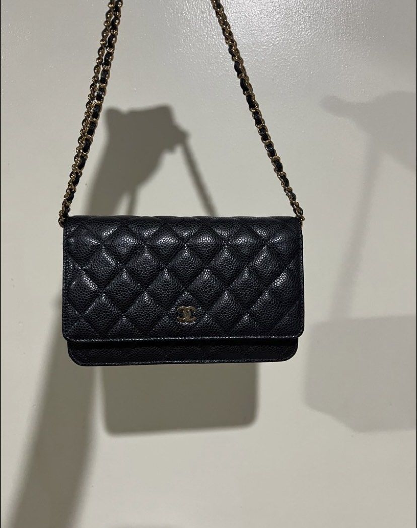 Chanel wallet on chain GHW CAVIAR FULL SET (Category: Luxury Bags & Wallets) located in Pasig City. Submitted by declutterapparel (Listing ID 1447534376, Image 1). Description: - Classic Chanel WOC - Black caviar leather - Gold hardware - Comes with original Chanel box, receipt, paper bag, dustbag, entrupy etc. - used - series 30. - dustbag damaged (peeling) & paper bag has stain or yellowing on the flower part Rfs: prefer bigger bags sure buyer 