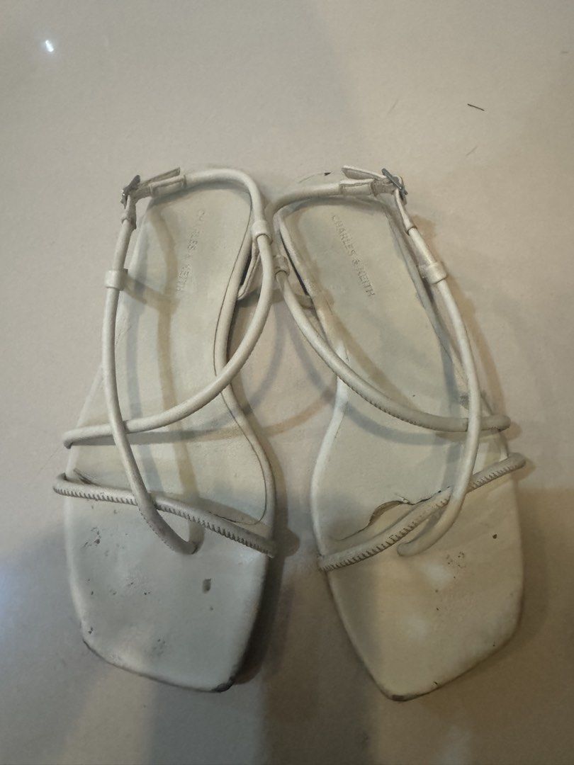 Charles & Keith White Strappy Flat Sandals Size 37 (Category: Flats & Sandals) located in Manila. Submitted by decluterthings888 (Listing ID 1456360389, Image 2). Description: - Brand: Charles & Keith - Color: White - Style: Strappy Flat Sandals - Toe Shape: Square Toe - Closure: Ankle Buckle - Size: 37.