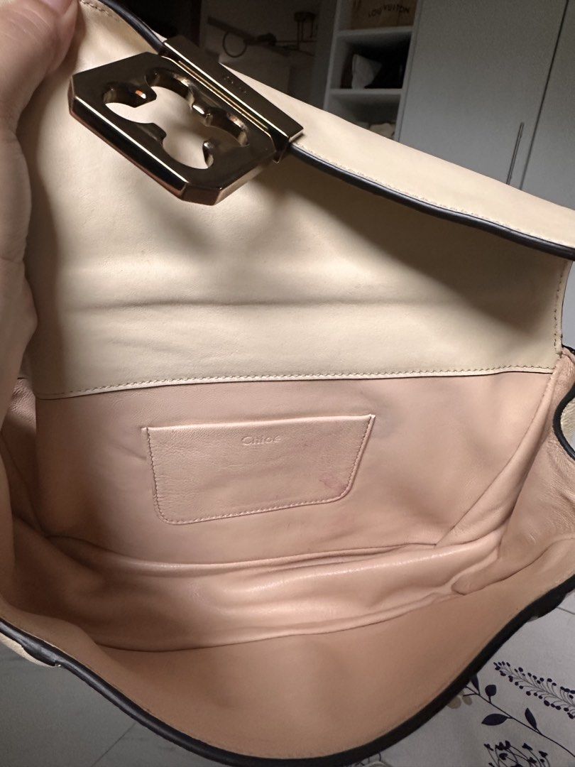 Chloe Elis Leather Shoulder Bag (Category: Luxury Bags & Wallets) located in Cabanatuan. Submitted by suyene88 (Listing ID 1456318183, Image 3). Description: - Genuine cream-colored Chloe bag - Made of authentic leather - Features the signature Chloe clasp closure - Includes a chain strap - Interior slip pocket - Clean interior - Versatile for day or night use.