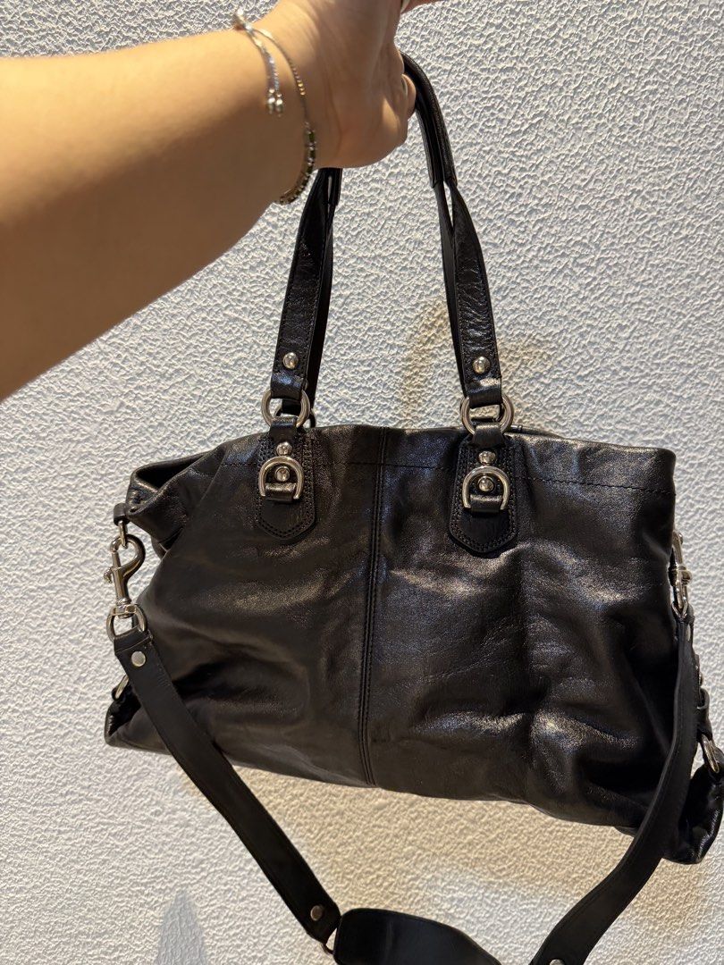 Coach Ashley Black Leather Carry All (Category: Luxury Bags & Wallets) located in Rizal. Submitted by bingbong21 (Listing ID 1456359424, Image 2). Description: - Genuine black leather Coach shoulder bag - Versatile with top handles and a detachable shoulder strap - Elegant silver hardware accents - Ample interior space for all your essentials - Ideal for everyday use - Shows some signs of wear, but remains in good, functional condition 🛍️ Shop P