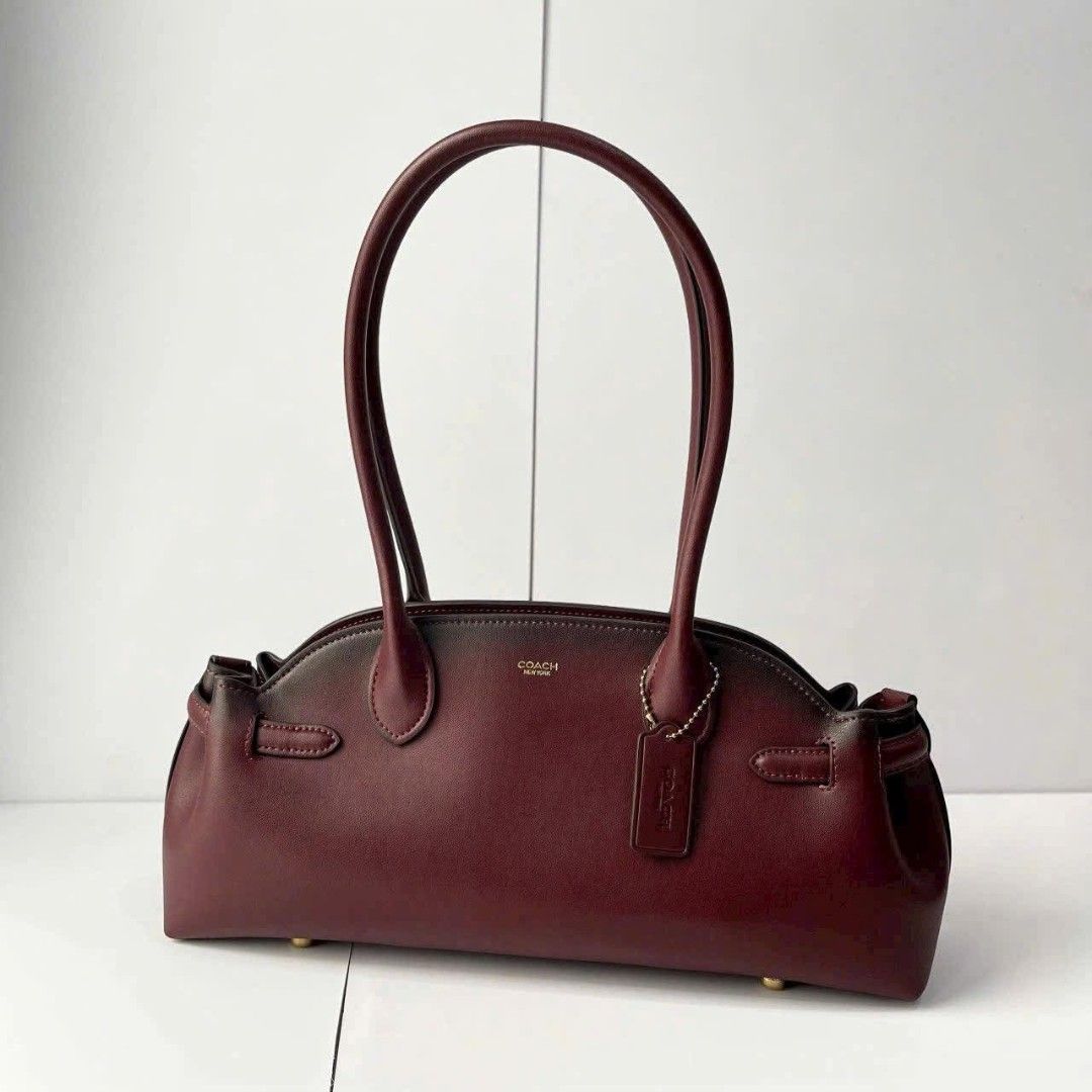 Coach Empire Carryall 34 (Category: Shoulder Bags) located in Quezon City. Submitted by bagsboutiqueph (Listing ID 1456420481, Image 1). Description: LAST PRICE POSTED. LIMITED STOCKS! BRANDNEW WITH INCLUSIONS. COLOR MAY SLIGHTLY VARY IN ACTUAL DUE TO LIGHTING AND CAMERA SETTING. OTHER PHOTOS WILL BE SEND DURING PURCHASE AND FOR SURE BUYERS ONLY. WHEN IN DOUBT, DO NOT ORDER. THANK YOU..