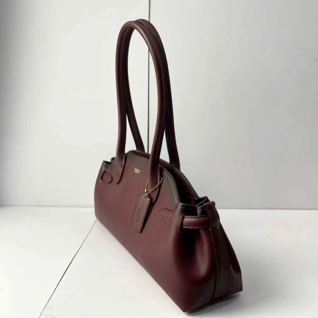 Coach Empire Carryall 34 (Category: Shoulder Bags) located in Quezon City. Submitted by bagsboutiqueph (Listing ID 1456420481, Image 2). Description: LAST PRICE POSTED. LIMITED STOCKS! BRANDNEW WITH INCLUSIONS. COLOR MAY SLIGHTLY VARY IN ACTUAL DUE TO LIGHTING AND CAMERA SETTING. OTHER PHOTOS WILL BE SEND DURING PURCHASE AND FOR SURE BUYERS ONLY. WHEN IN DOUBT, DO NOT ORDER. THANK YOU..