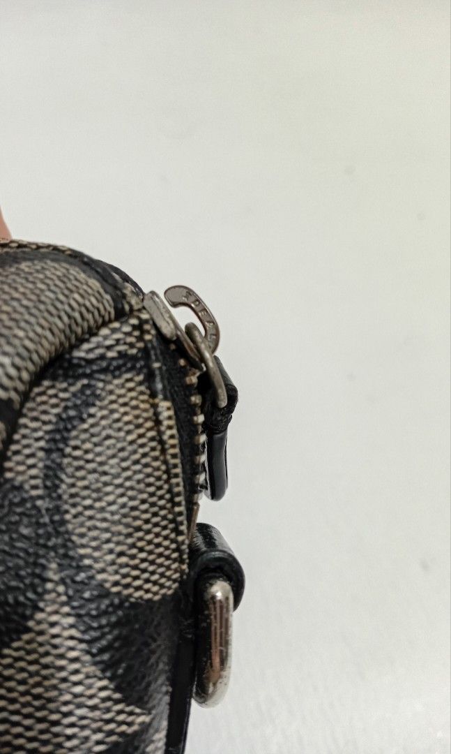 Coach Monogram Mini boston handbag (Category: Luxury Bags & Wallets) located in Manila. Submitted by eriiicaspage (Listing ID 1456275267, Image 3). Description: PREOWNED Lightly Used COACH Monogram Classic Canvas Mini Boston handbag - Signature C pattern in black and grey -Small - IDEAL brand Zipper - Ideal size for everyday essentials creeds Not Present Off /Legit NGA Good Condition 9/10 Sold As Is ,Bag Only ..