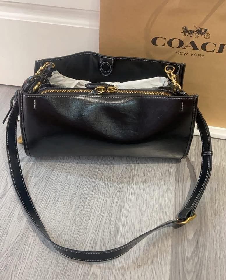 Coach Rogue 34 in Black (Category: Shoulder Bags) located in Quezon City. Submitted by bagsboutiqueph (Listing ID 1456349741, Image 2). Description: LAST PRICE POSTED. LIMITED STOCKS! BRANDNEW WITH INCLUSIONS. COLOR MAY SLIGHTLY VARY IN ACTUAL DUE TO LIGHTING AND CAMERA SETTING. OTHER PHOTOS WILL BE SEND DURING PURCHASE AND FOR SURE BUYERS ONLY. WHEN IN DOUBT, DO NOT ORDER. THANK YOU..