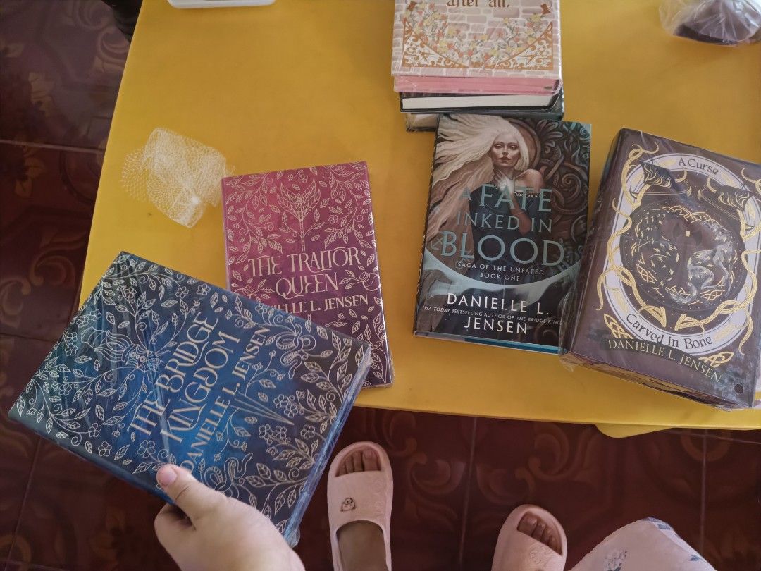 Danielle Jensen Set Only ( I can't separate items,only sold as set tyy) (Category: Storybooks) located in Dasmarinas. Submitted by readerray (Listing ID 1456417814, Image 2). Description: DANIELLE JENSEN SET 6000 pesos fairyloot bridge kingdom duo Fairyloot a cursed carved in blood Sorry,dont have book 1 in FL edition UK 1st printing ed A Fate Inked In Blood All in Great Condition Please note that there may be slight dents or folds caused during 