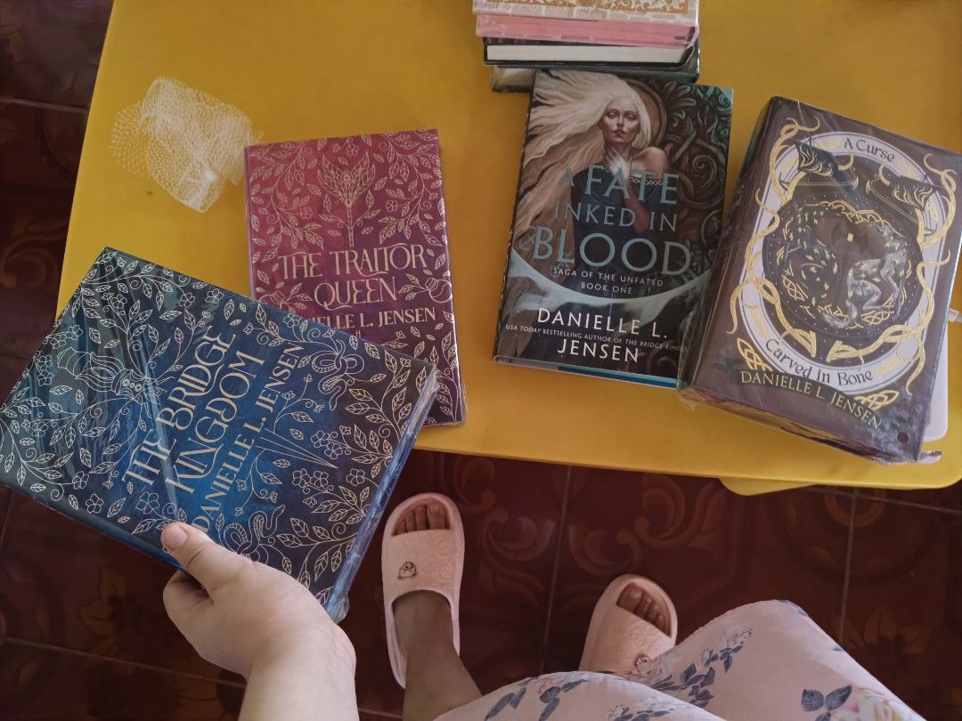 Danielle Jensen Set Only ( I can't separate items,only sold as set tyy) (Category: Storybooks) located in Dasmarinas. Submitted by readerray (Listing ID 1456417814, Image 3). Description: DANIELLE JENSEN SET 6000 pesos fairyloot bridge kingdom duo Fairyloot a cursed carved in blood Sorry,dont have book 1 in FL edition UK 1st printing ed A Fate Inked In Blood All in Great Condition Please note that there may be slight dents or folds caused during 
