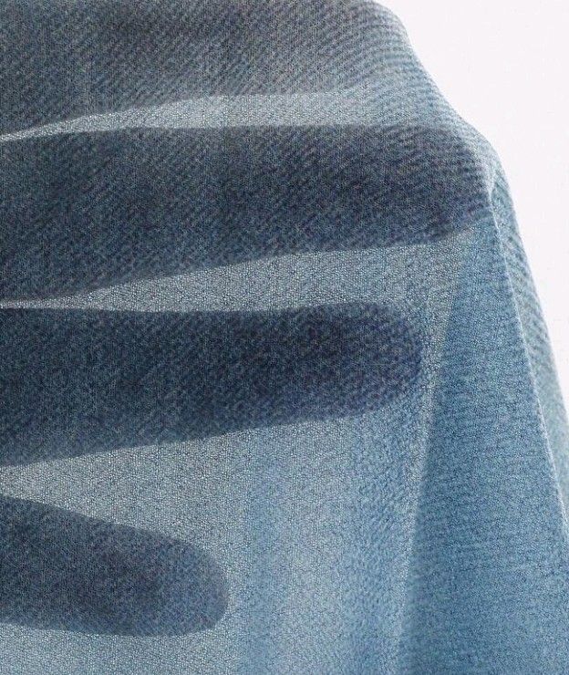 Dazy Blue Tie-Front Bell Sleeve Sheer Top (Category: Blouses) located in San Pedro. Submitted by JohnsonKeeps (Listing ID 1456312240, Image 3). Description: - Sheer blue fabric / long sleeves - Light material - Size: Large - Tie-front design - Bell sleeves - Unique tie-dye pattern - Versatile for layering or wearing on its own - Suitable for night outs or casual days - Comfortable and stylish.
